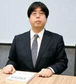 　取材に応じる中崎尚弁護士