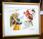　フランスのマクロン大統領がＸに投稿した「ドラゴンボール」のキャラクターと鳥山明さんのサインが入った色紙（マクロン氏のＸから・共同）