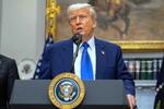　１２日、米ワシントンのホワイトハウスで記者の質問に答えるトランプ大統領（ＡＰ＝共同）