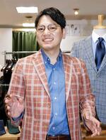 　商店街再興の意気込みを語る、岐阜柳ケ瀬商店街振興組合連合会理事長の水野琢朗さん＝５月１８日、岐阜市