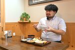 大満足の記者