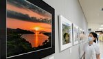 岡さんが撮影した絶景の写真が並ぶ会場