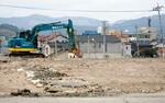 　被災建物の公費解体作業が完了した石川県輪島市の「朝市通り」周辺＝２５日午前