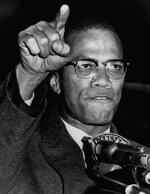 　人種差別撤廃を訴える集会で演説するマルコムＸ＝１９６３年５月、米ニューヨークのハーレム地区（ゲッティ＝共同）