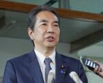 　石破首相に辞表を提出後、記者団の取材に応じる江藤氏