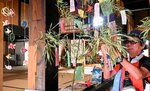 ササに短冊を飾り付ける来館者＝２日、倉吉市東岩倉町の倉吉淀屋