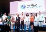 　パリ五輪のメインプレスセンターで行われた記者会見に出席した米国のケーレブ・ドレセル（右端）ら＝２５日、パリ（共同）
