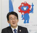 　インタビューに答える万博協会交通部長の淡中泰雄さん＝２０２５年２月２６日、大阪市