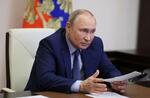 　モスクワ郊外の公邸でテレビ会議を主宰するロシアのプーチン大統領＝２０２２年６月（ロイター＝共同）