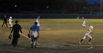 ナイターでプレーを楽しむ中浜フェニックスと境港ロータリークラブ