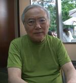 　都内でインタビューに答える上野景文氏