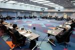 　刑事裁判の再審制度見直しを検討する法制審議会部会に臨む委員ら＝２１日午前、法務省