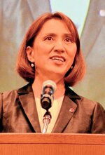 優良賞を受賞した八頭町商工会の小山由香さん＝１３日、米子コンベンションセンター
