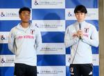 　東京都内で開かれたイベントで、あいさつする田中。左は藤田＝３１日
