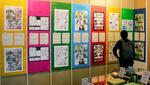 　国連パビリオンで開かれている１０人の漫画家による人権問題をテーマにした展示会＝２日、大阪市此花区の夢洲