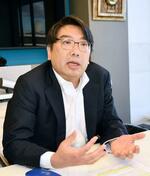　インタビューに応じるＭＩＧＡの俣野弘長官（共同）