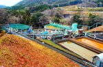 旧岩美鉱山坑廃水処理施設＝岩美町荒金（鳥取県提供）