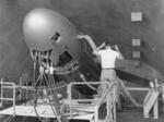 　発射台で核巡航ミサイル「メースＢ」の整備をする技術者＝１９６２年４月、沖縄県内（沖縄県公文書館所蔵）