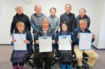 完成したマップを手に意欲を燃やす「鳥取まちなかガイドの会」のメンバー＝１月３１日、鳥取市末広温泉町のまちパル鳥取
