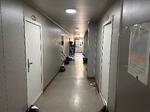 　ミャンマー東部シュエココの特殊詐欺拠点だった建物内。１０畳ほどの部屋が並び、たばこの煙が充満していた＝３月１２日（共同）