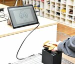 スマートフォンをかざして登園や降園などの保育業務を管理するシステム