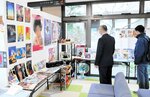 レコードや映画のパンフレットが並ぶロビー＝１３日、米子市彦名町の米子中海クリニック