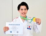 東アジア選手権の男子ジュニア７６㌔級で金メダルを獲得した柿本大輝＝米子北高