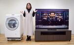 　パナソニックのリファービッシュ品と渡辺暦さん＝東京都品川区