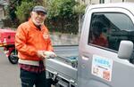 　弁当の配達ボランティアをする山中義和さん＝福井県高浜町