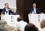 他都市の例に触れながら、よりよいまちづくりについて意見を交わす藤井教授（左）と伊木市長＝２３日、鳥取県米子市久米町のＡＮＡクラウンホテル