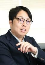　「世の中の多くの問題は、経営の問題として捉えられる」と話す岩尾俊兵さん
