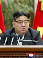 　２０２３年１２月、北朝鮮の朝鮮労働党中央委員会拡大総会に臨む金正恩党総書記＝平壌（朝鮮中央通信＝共同）