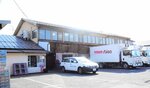 トスク６店舗と覚書を締結した東宝企業＝３日、鳥取県倉吉市大正町２丁目の同社本部