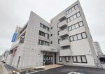 　いわき信用組合本部と本店営業部が入る建物＝１９日午前、福島県いわき市
