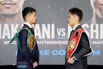 　世界バンタム級王座統一戦の記者会見後、向き合うＷＢＣバンタム級王者の中谷潤人（左）とＩＢＦ同級王者の西田凌佑＝１８日、東京都文京区