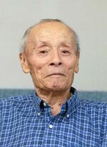 　小山正明さん