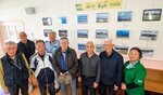 展示された写真と撮影者ら