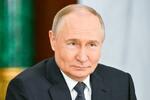 　記者会見するロシアのプーチン大統領＝１４日、モスクワ（タス＝共同）
